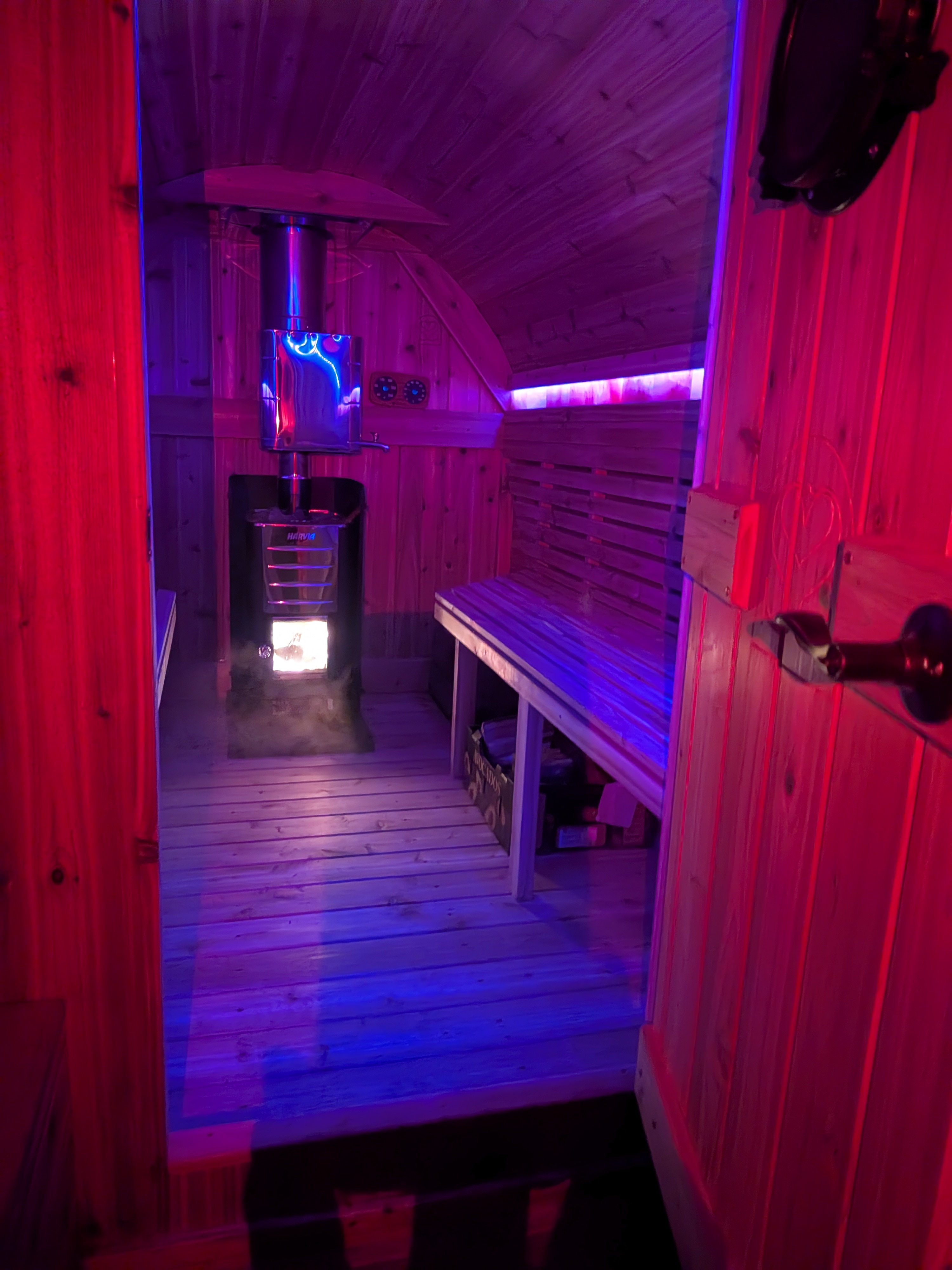 Sauna interior with blue and red LED lighting